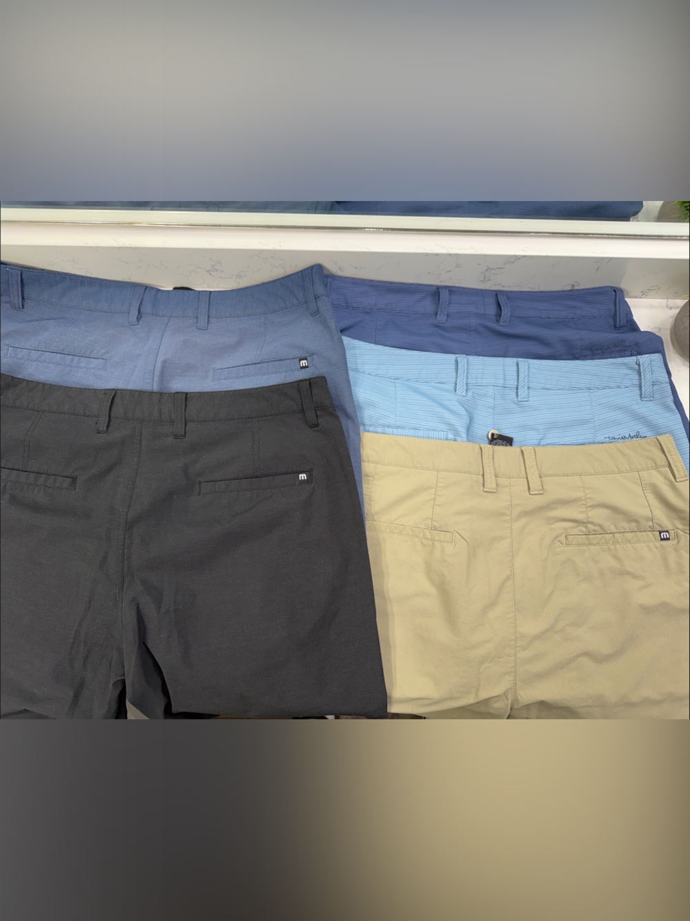 TravisMathew Men's Flat Front Shorts 5 pair- Black, Blue, Light Blue, Tan, Black - Picture 3 of 3